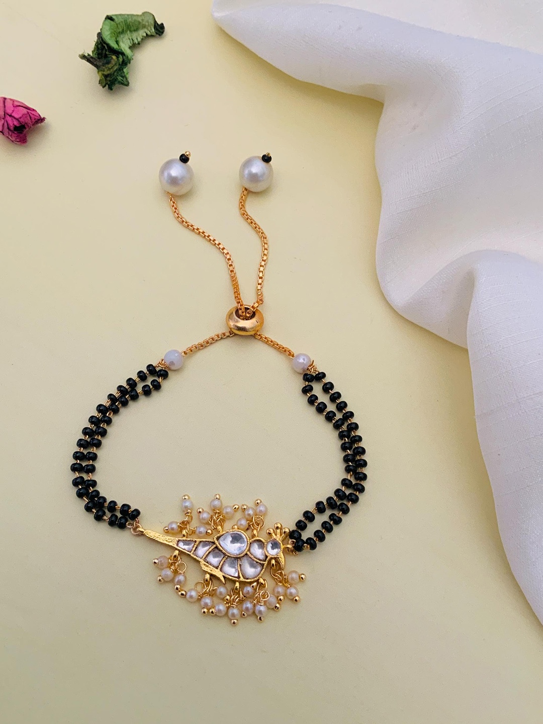 

Anouk Gold-Plated Stone-Studded and Beaded Hand Mangalsutra