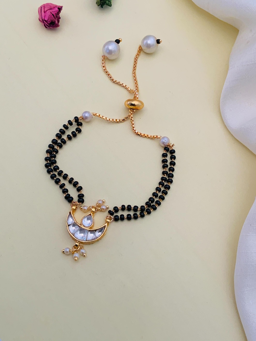 

Anouk Black Gold-Plated Stones & Beads Mangalsutra