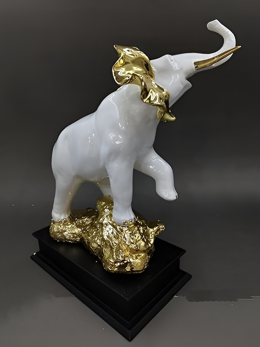 

Aura White & Gold Toned Elephant Marble Figurine Showpiece