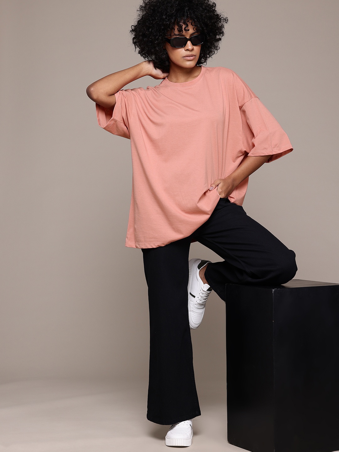 

Roadster Women Solid Drop-Shoulder Sleeves Oversized T-shirt, Peach
