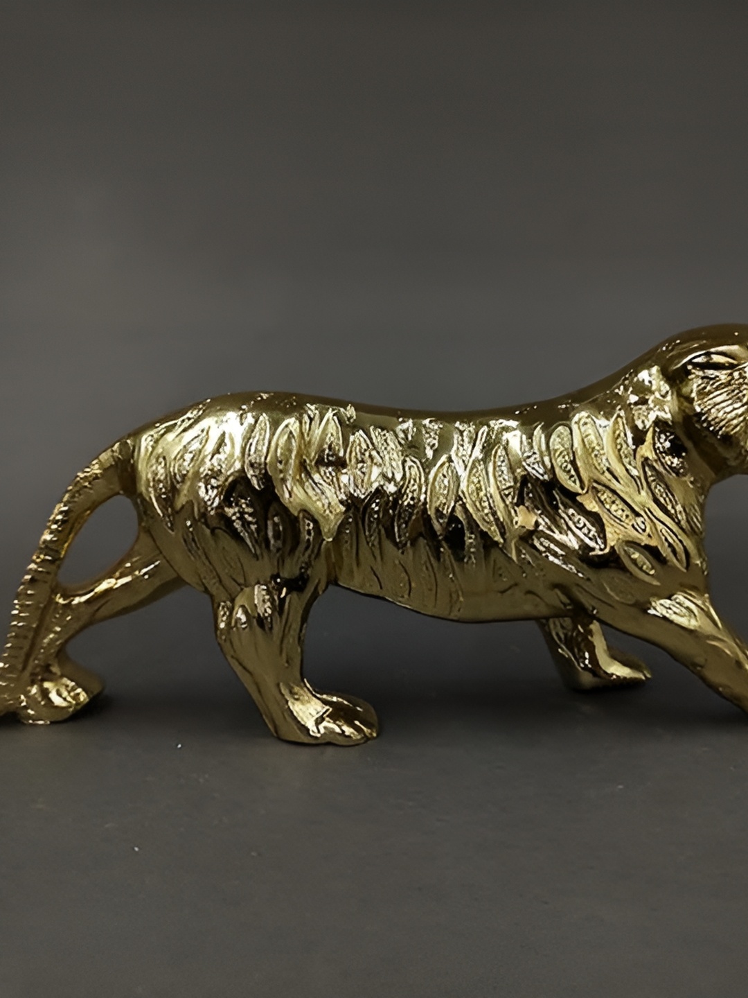 

Aura Gold-Toned Tiger Figurine Showpiece