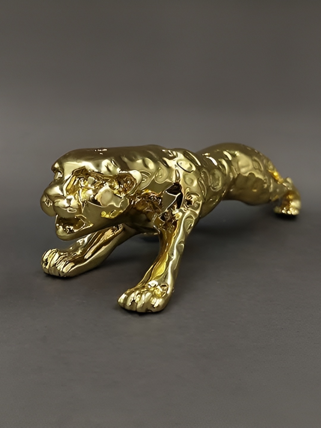 

Aura Gold-Toned Tiny Figurine Showpiece