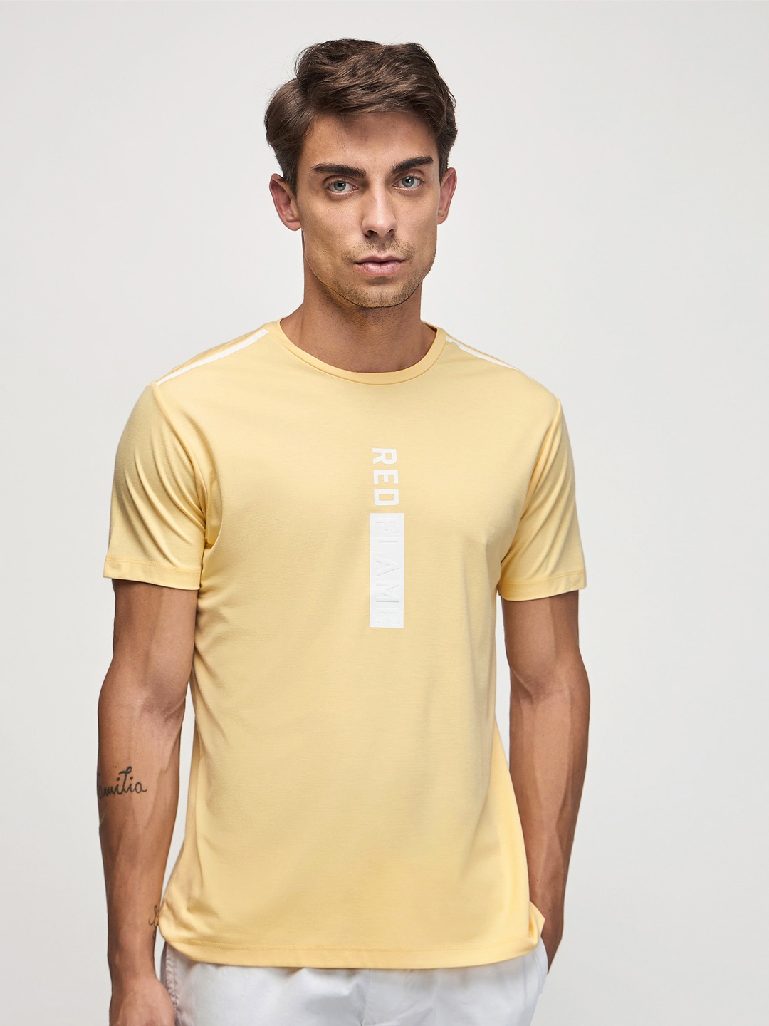 

Red Flame Men Solid Round Neck T-shirt, Yellow