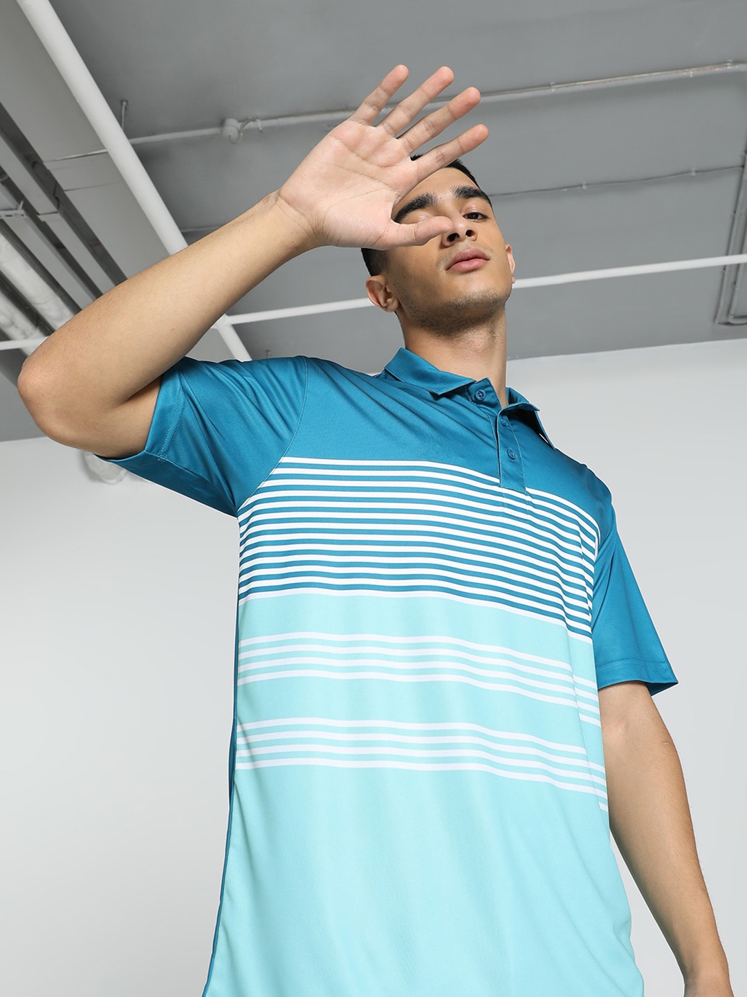 

Puma Men Solid Relaxed Fit Polo T-Shirts, Blue