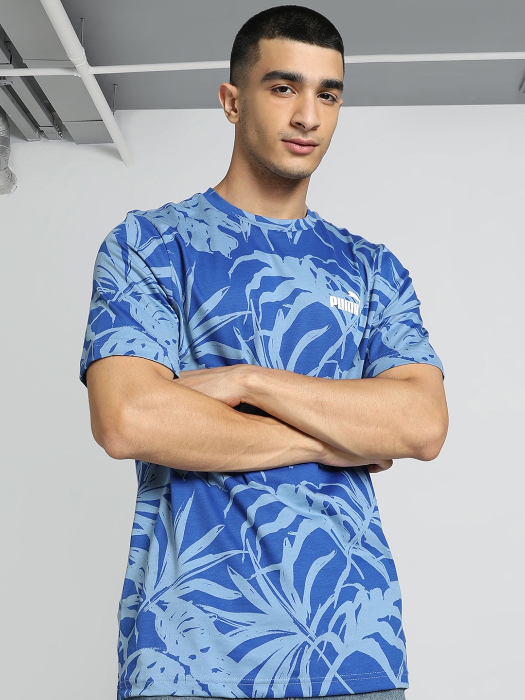 

Puma PALM RESORT Printed T-shirt, Blue