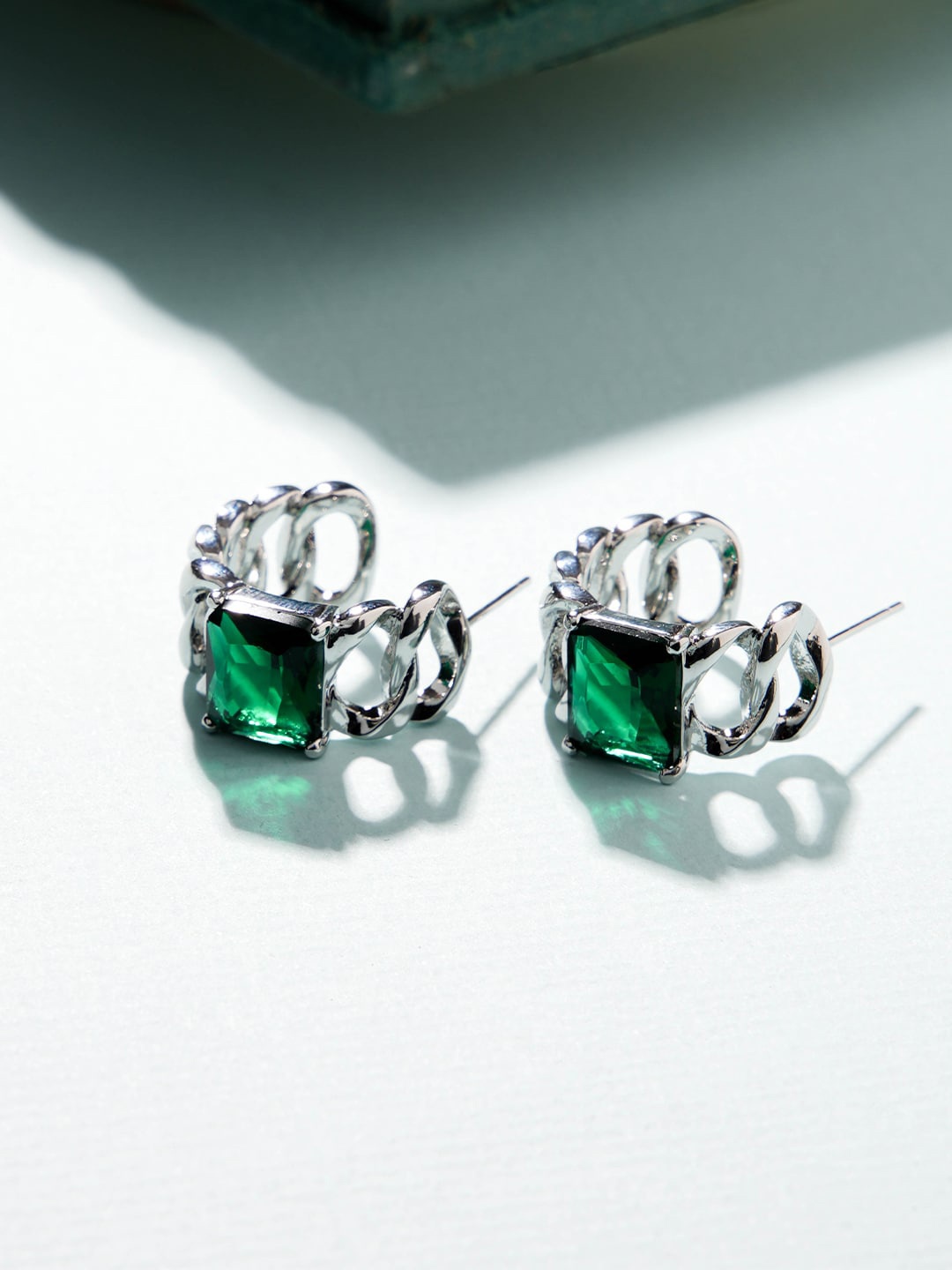 

SWASHAA Silver-Plated Emerald Studded Contemporary Studs Earrings