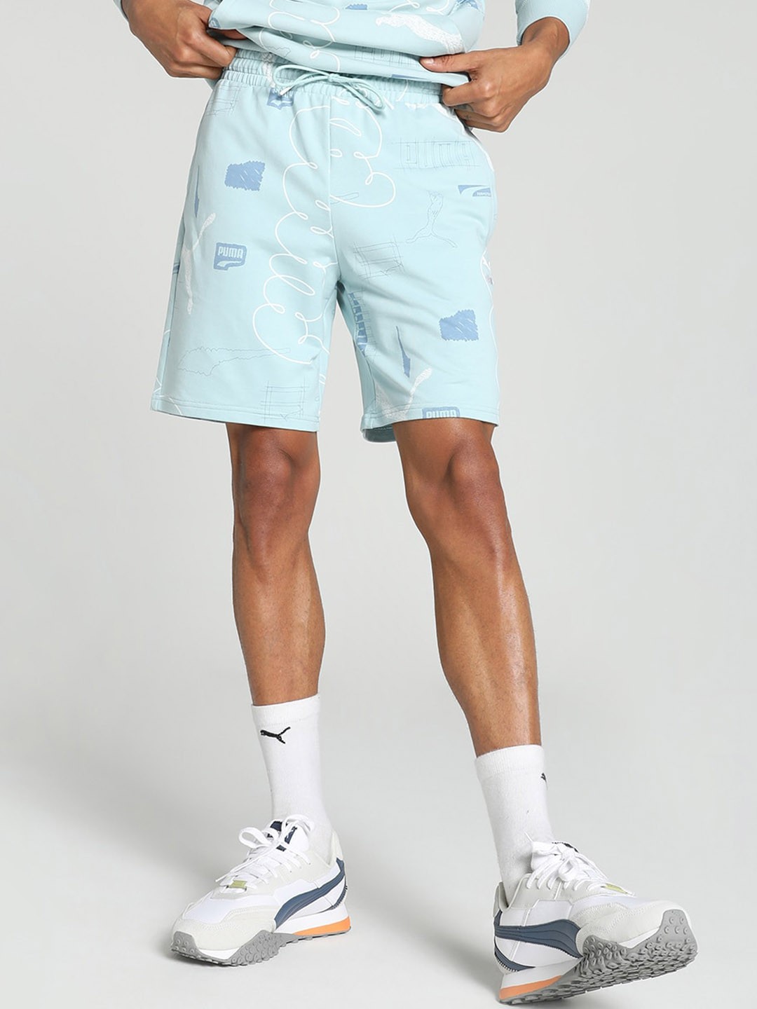 

Puma CLASSICS BRAND LOVE Men Graphic Printed Shorts, Blue