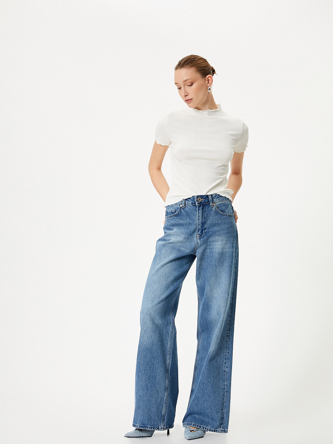 

Koton Women Solid Round Neck T-shirt, Off white