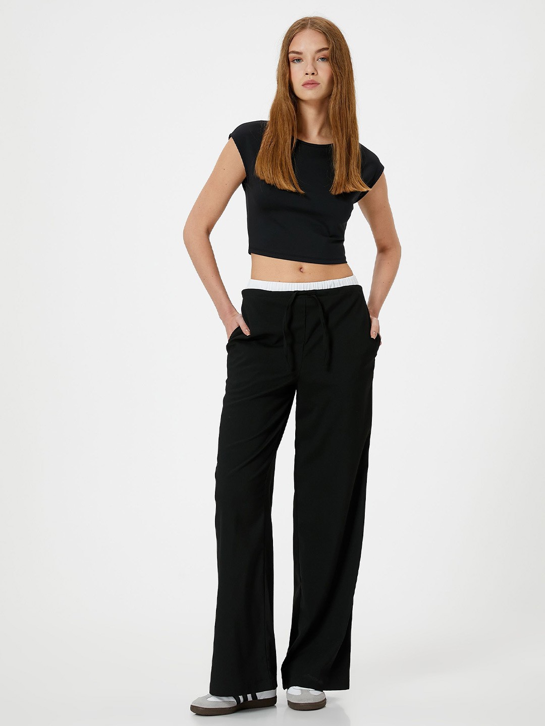 

Koton Women Solid Slim Fit T-shirt, Black