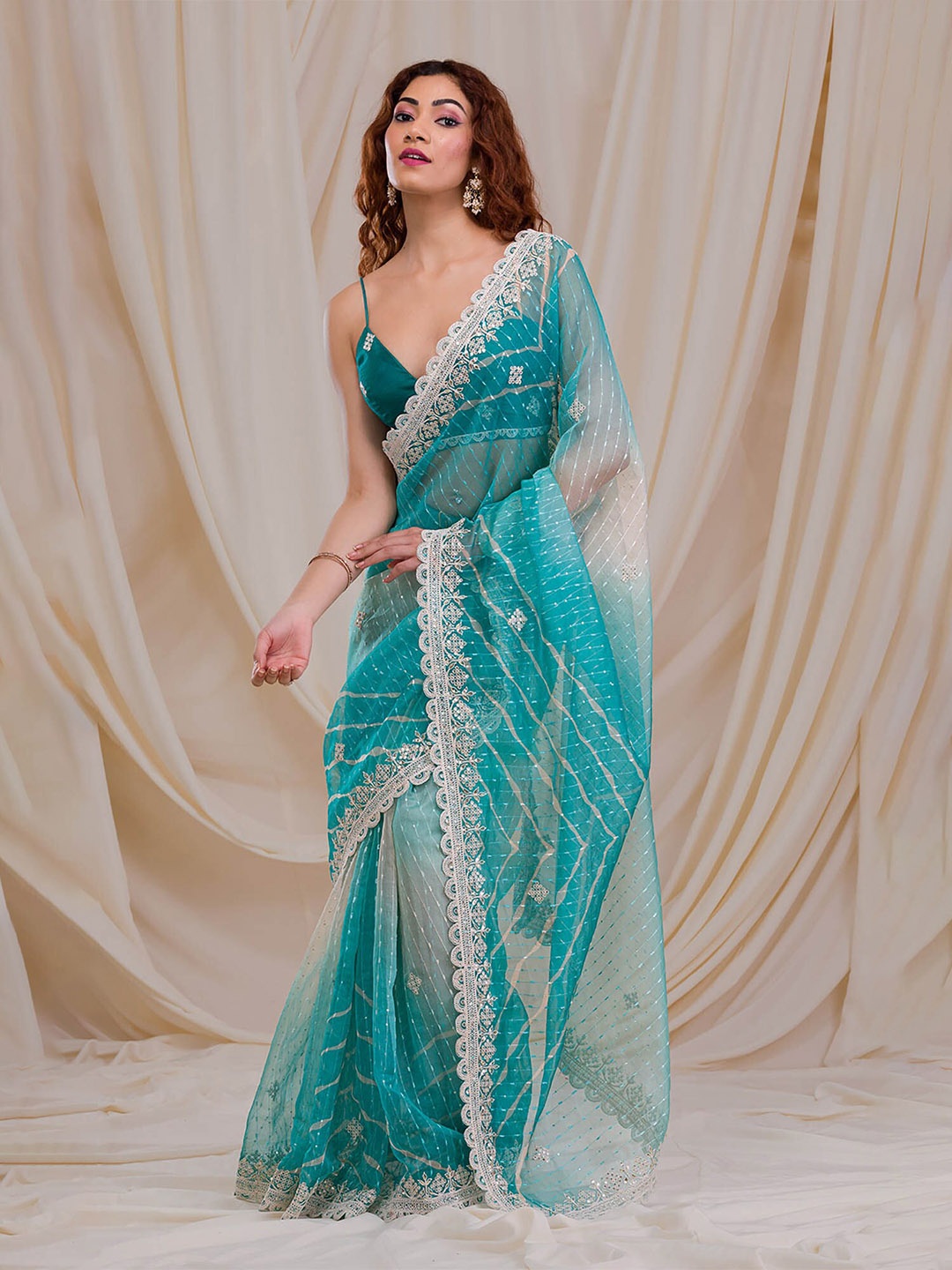 

Jinal & Jinal Embellished Sequinned Poly Georgette Tussar Saree, Blue