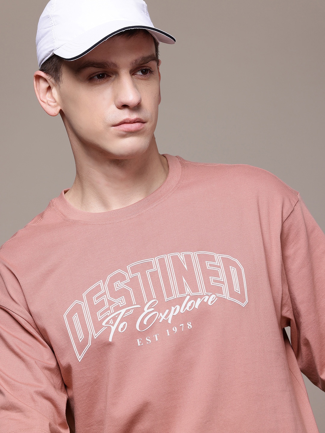 

The Roadster Lifestyle Co. Men Printed Pure Cotton Relaxed Fit T-shirt, Pink