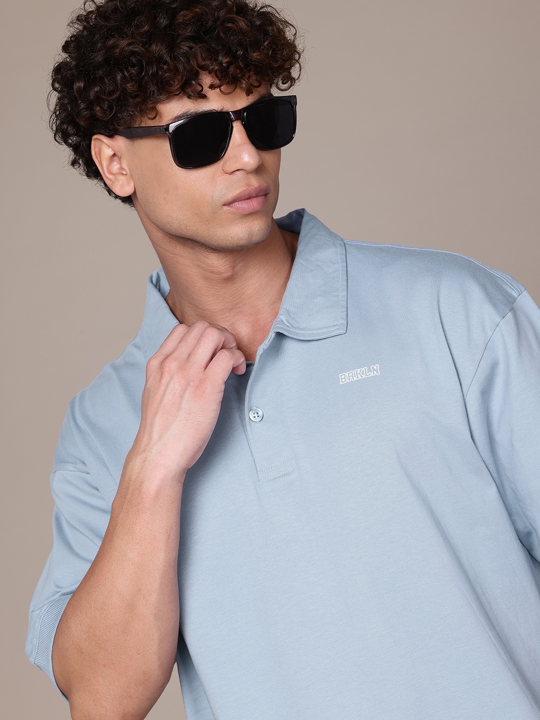 

The Roadster Lifestyle Co. Men Polo Collar Pure Cotton Relaxed Fit T-shirt, Blue
