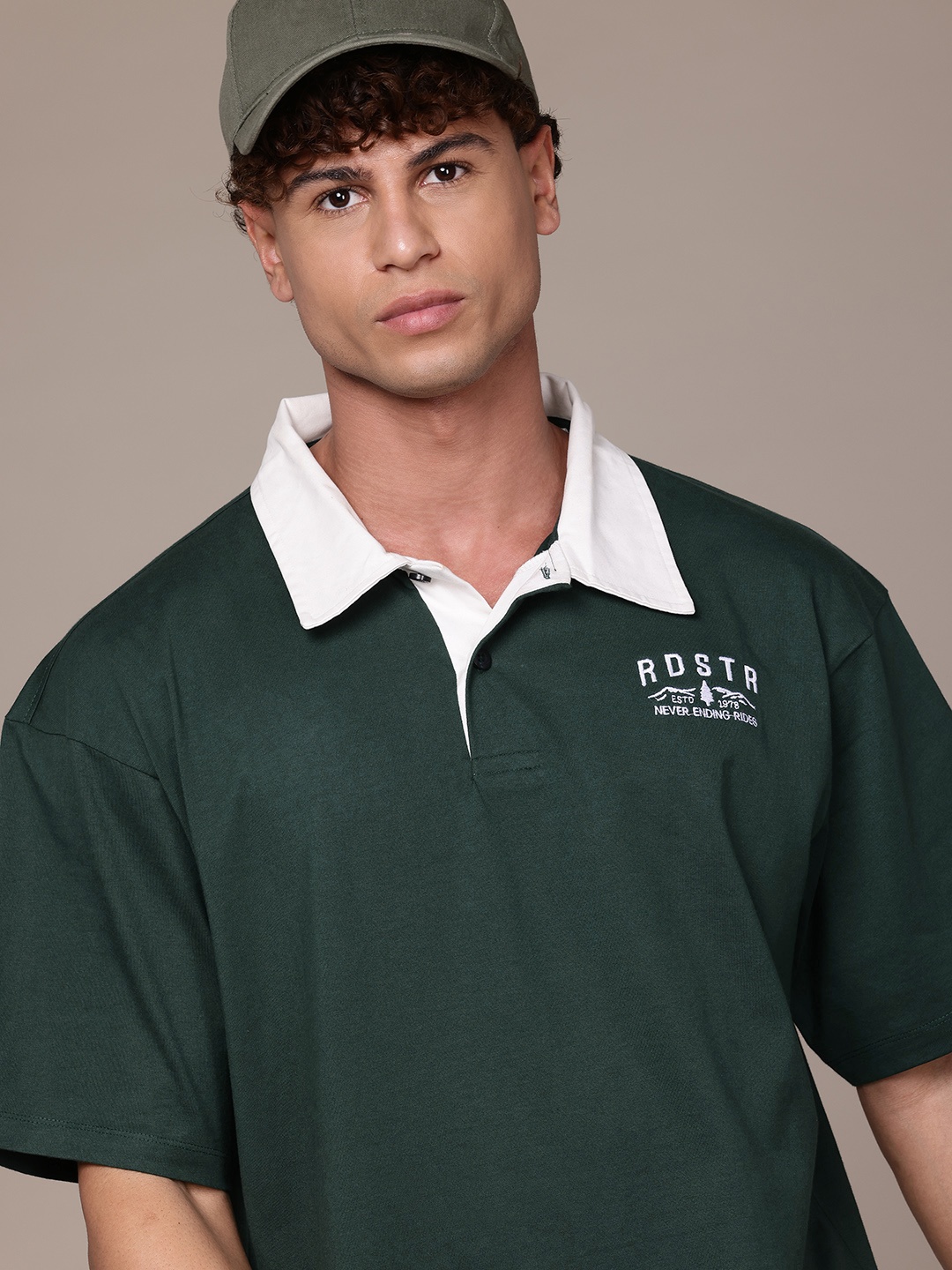 

The Roadster Lifestyle Co. Men Polo Collar Pure Cotton Relaxed Fit T-shirt, Green