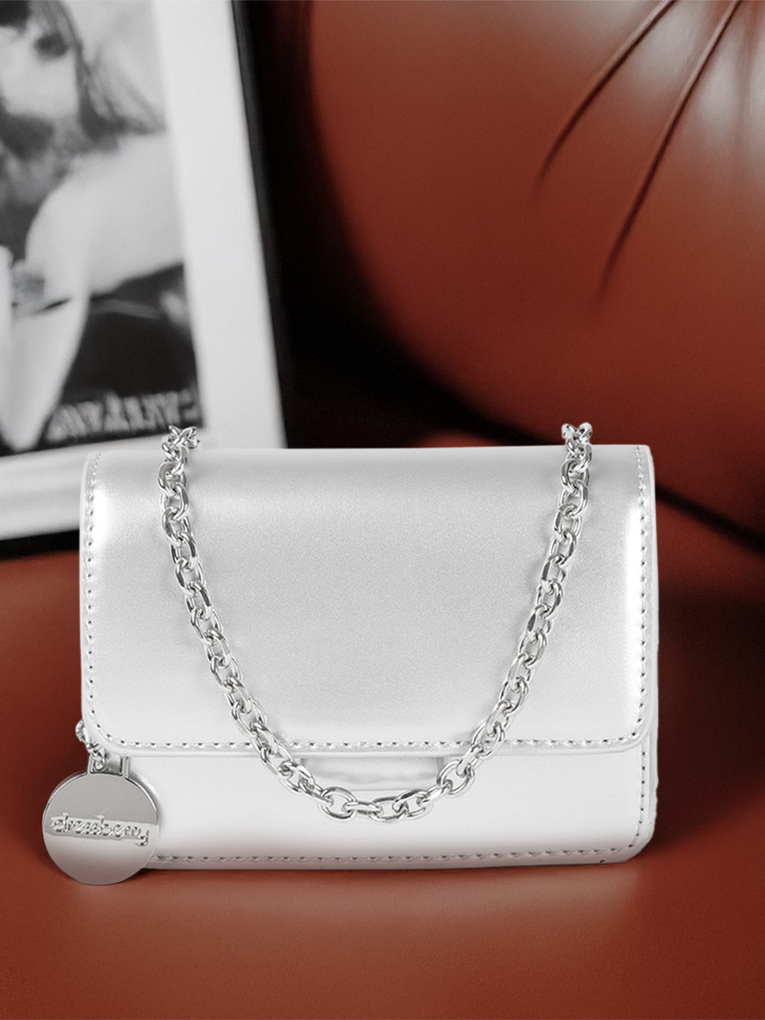 

DressBerry Small Structured Sling Bag, Silver