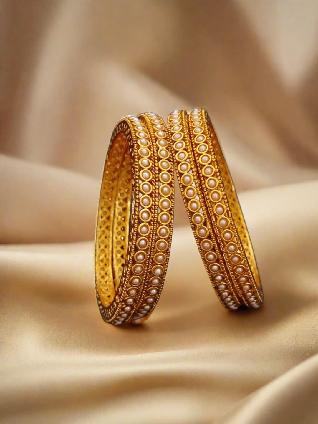 

Pihtara Jewels Set Of 4 Gold Plated Beaded Bangles