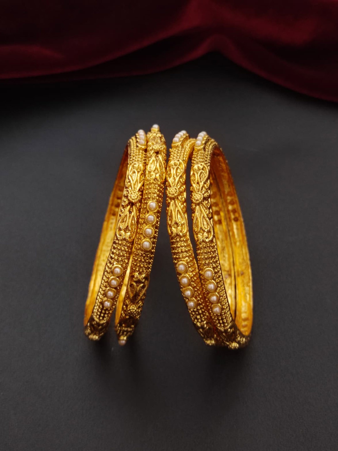 

Pihtara Jewels Set Of 4 Gold Plated Beaded Bangles