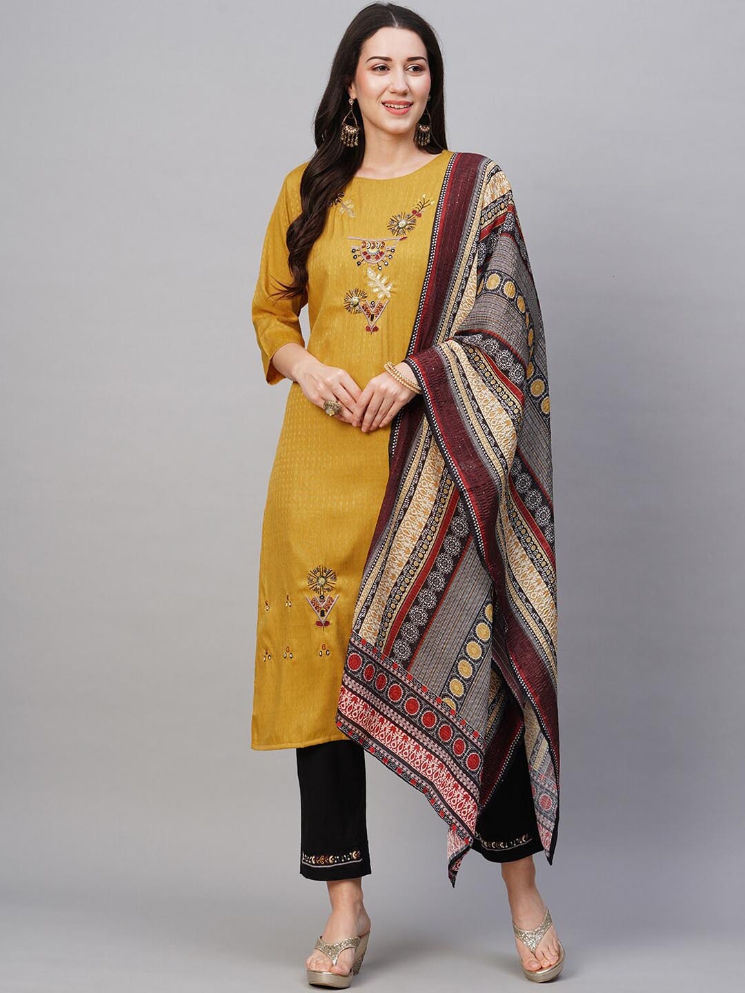 

Kiana Ethnic Motifs Self Design Straight Sequinned Kurta With Trousers & Dupatta, Mustard