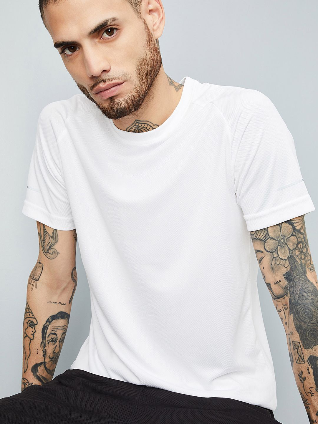 

max Men Round Neck Solid Polyester T-shirt, White