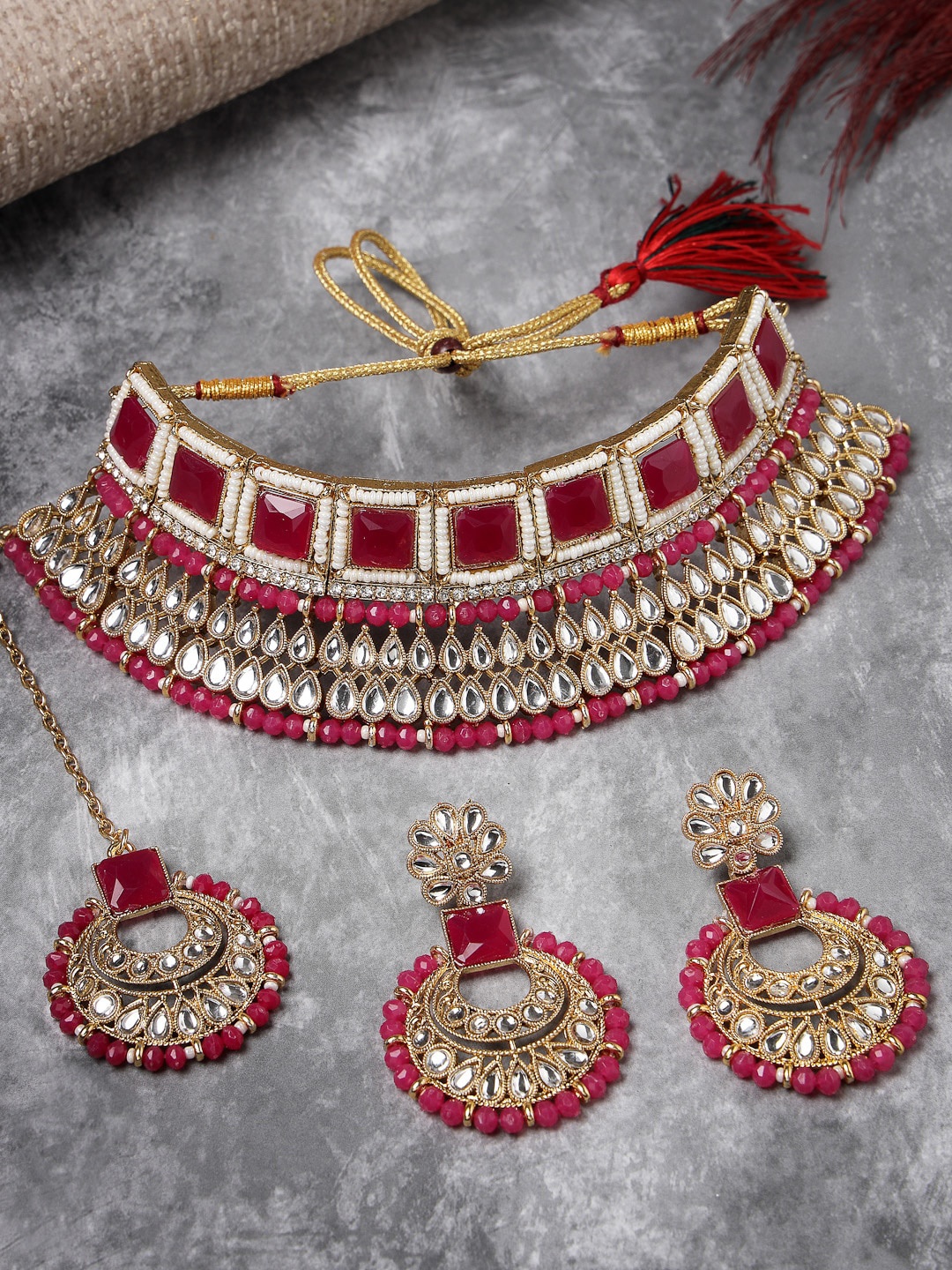 

Sukkhi Gold Plated Kundan Studded & Beaded Jewellery Set