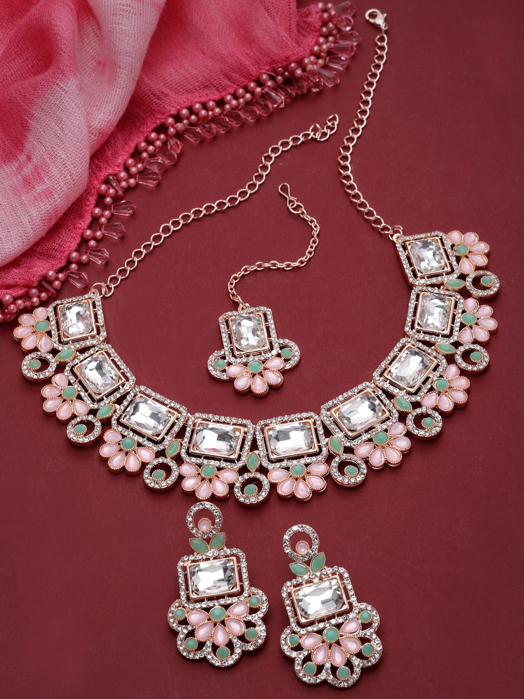 

Sukkhi Rose Gold-Plated American Diamond Necklace and Earrings, Pink