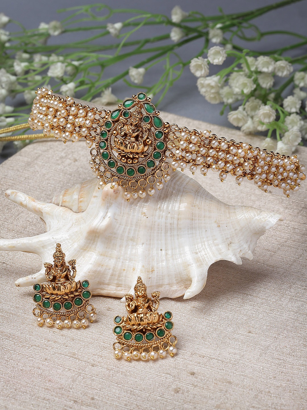 

Sukkhi Gold Plated Stones Studded & Beaded Temple Jewellery Set