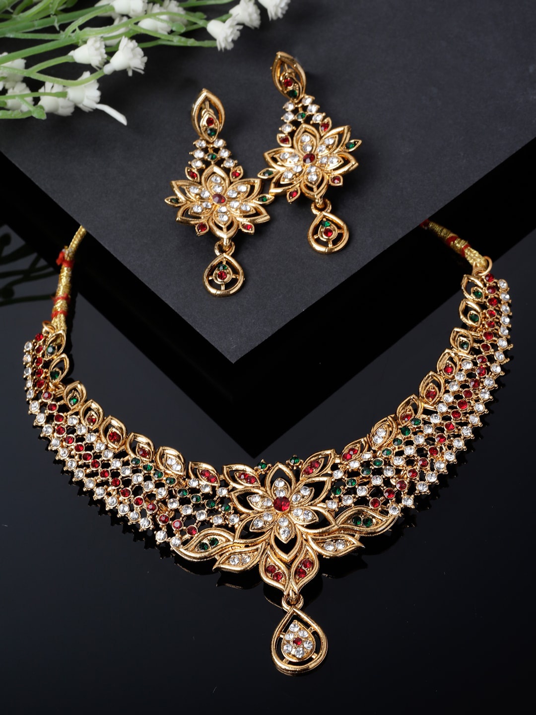 

Sukkhi Gold-Plated American Diamond Studded Jewellery Set