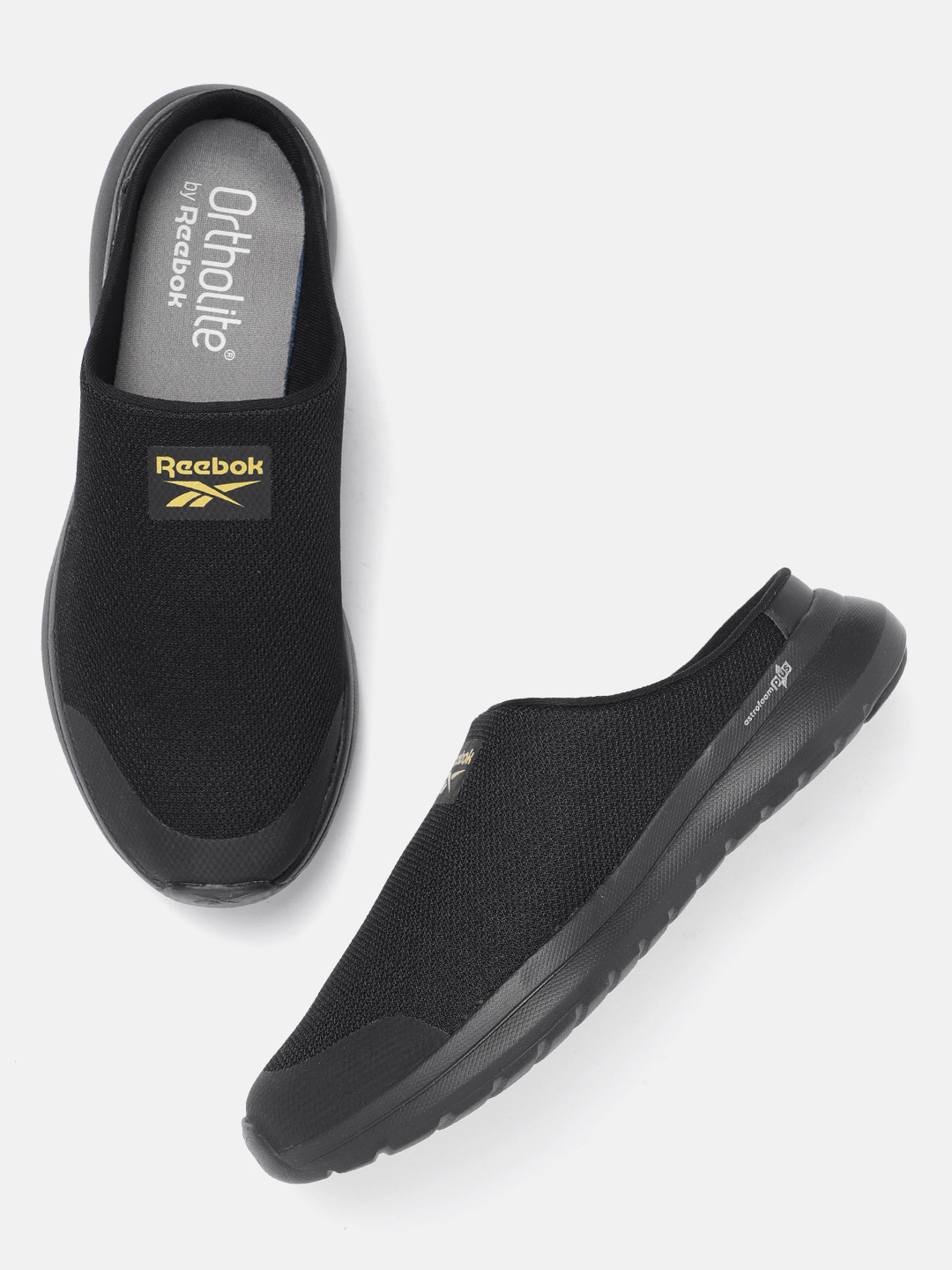 

Reebok Men Woven Design Comfort Wonderer Mule Walking Shoes, Black