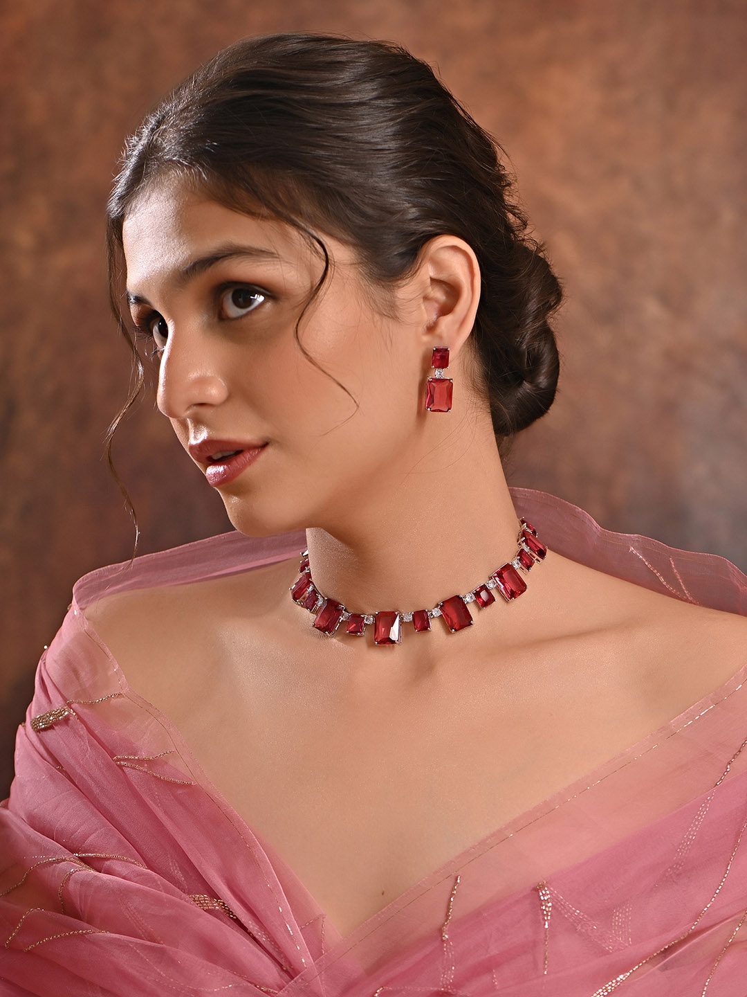 

Fida Silver Plated Stones Studded Necklace And Earrings