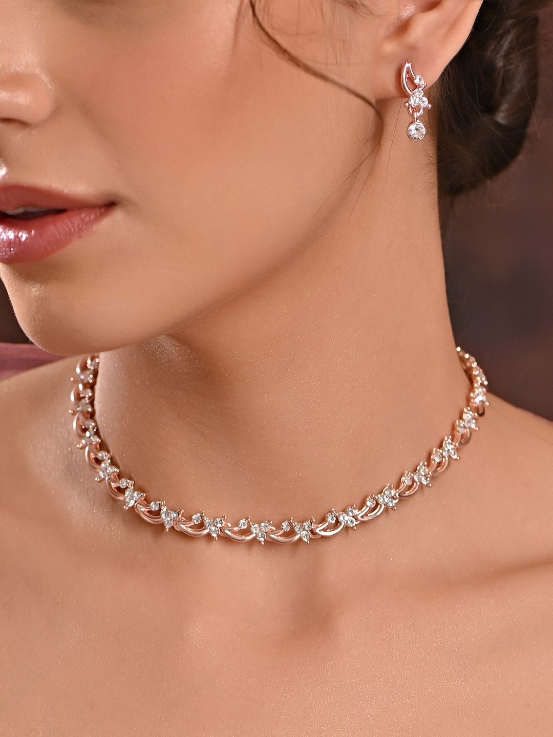 

Fida Rose Gold Plated American Diamond Stones Studded Necklace And Earrings