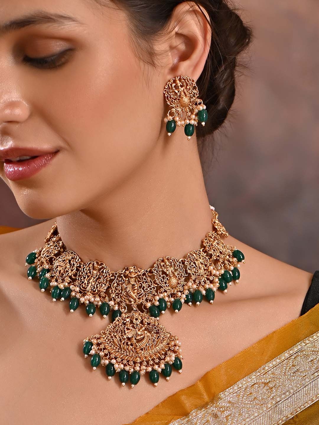 

Fida Gold-Plated Artificial Stones and Beads Studded & Beaded Temple Jewellery Set