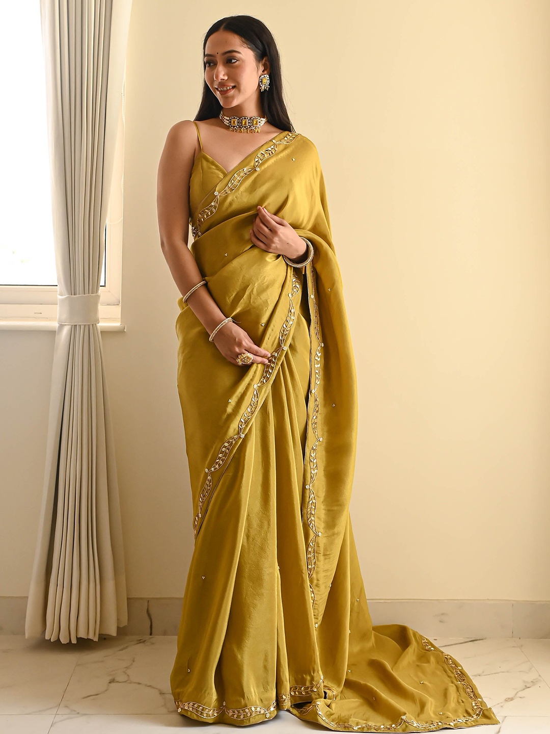 

Bunaai Ethnic Motifs Beads and Stones Tissue Saree, Green