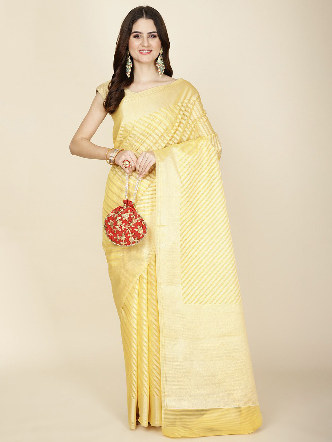 

Meena Bazaar Striped Woven Design Cotton Blend Saree, Yellow