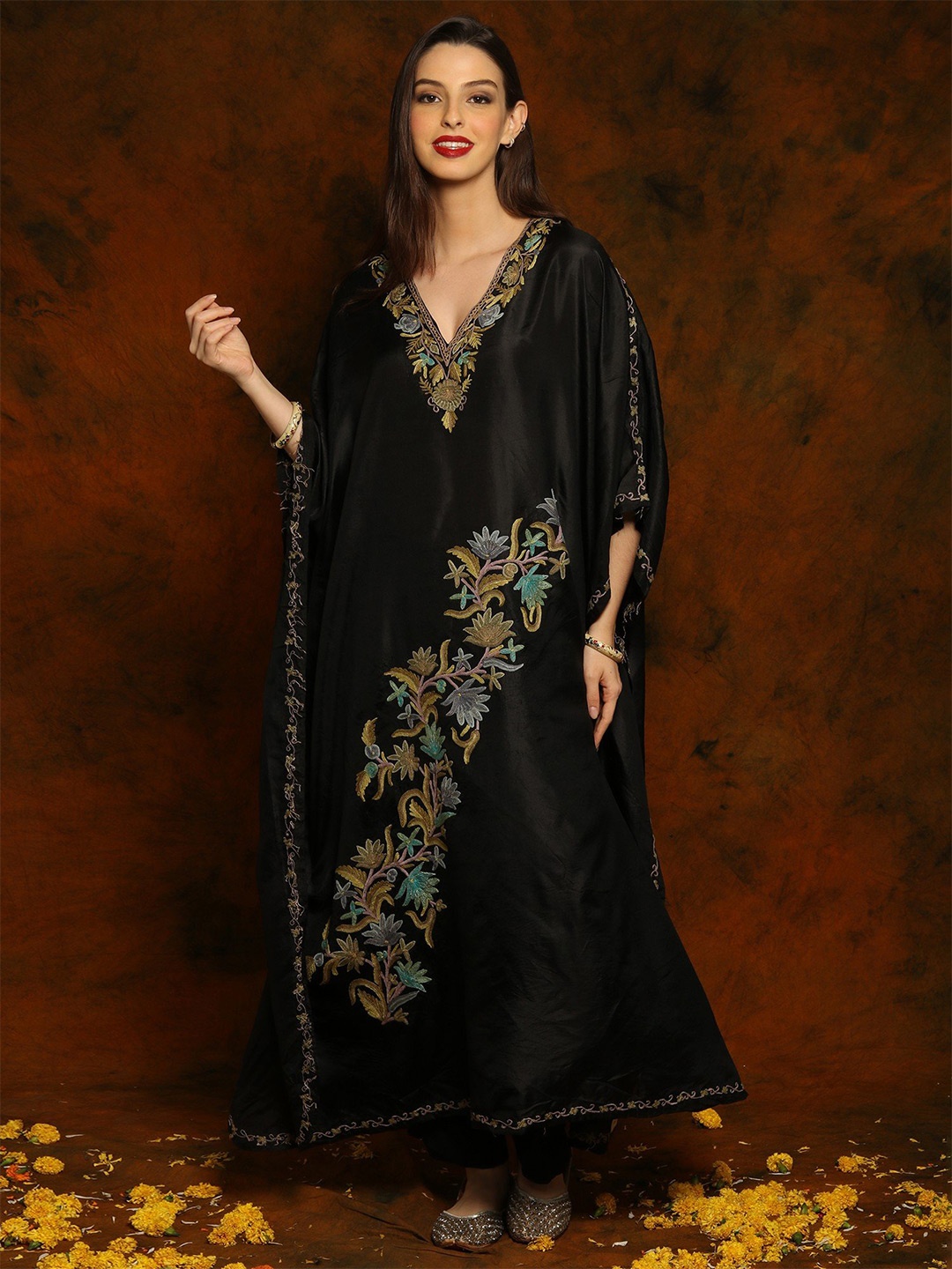 

Exotic India Black Silk Self Shine Kaftan with Floral Aari Embroidery on Neck