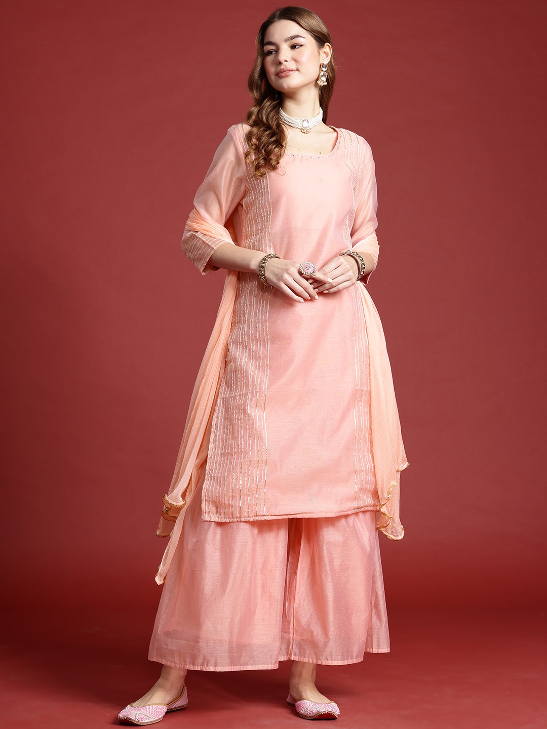 

Anouk Striped Regular Kurta with Sharara & With Dupatta, Peach