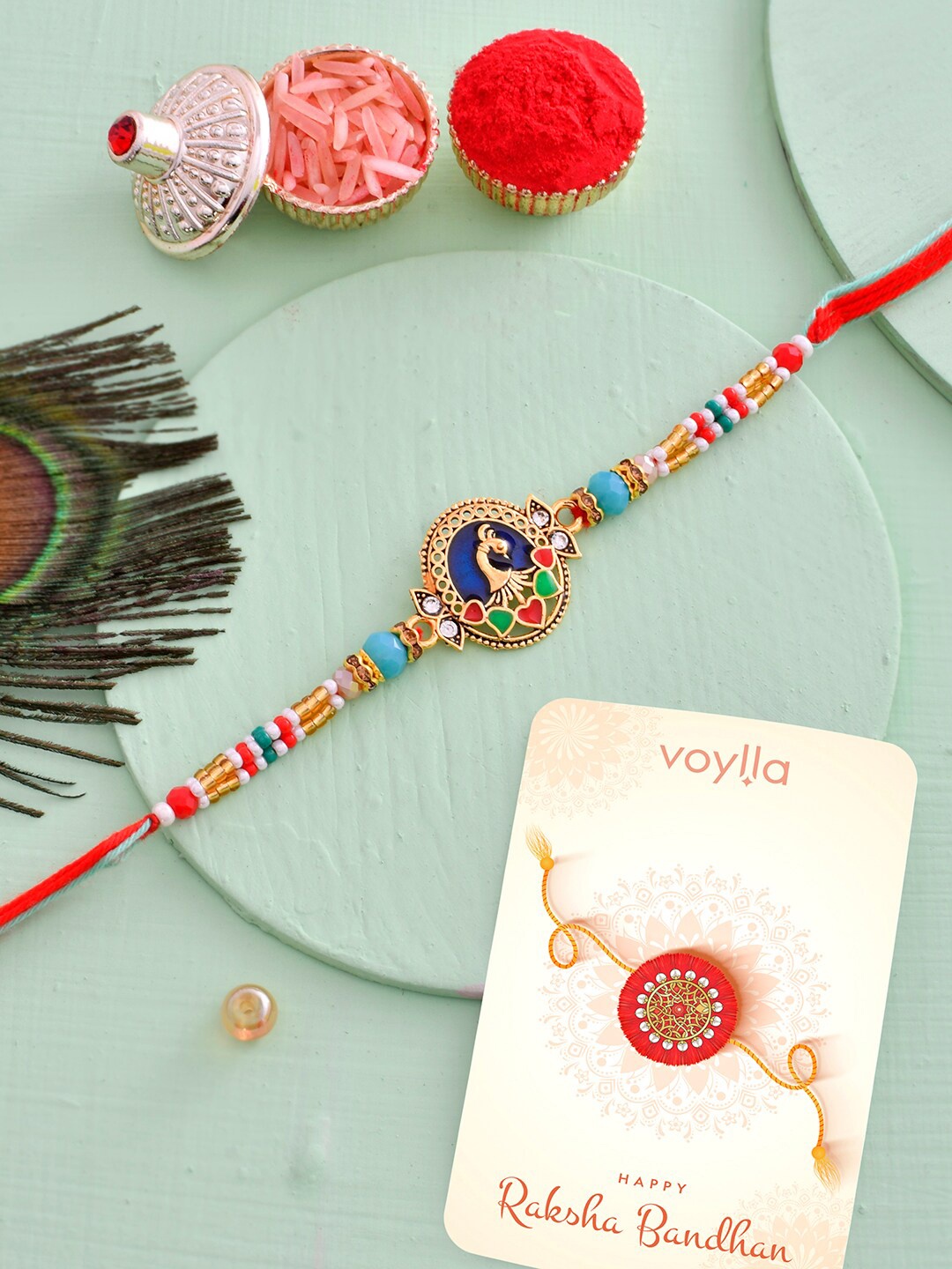 

Voylla Colourful Thread Beaded Traditional Peacock Motif Rakhi For Brother, Orange