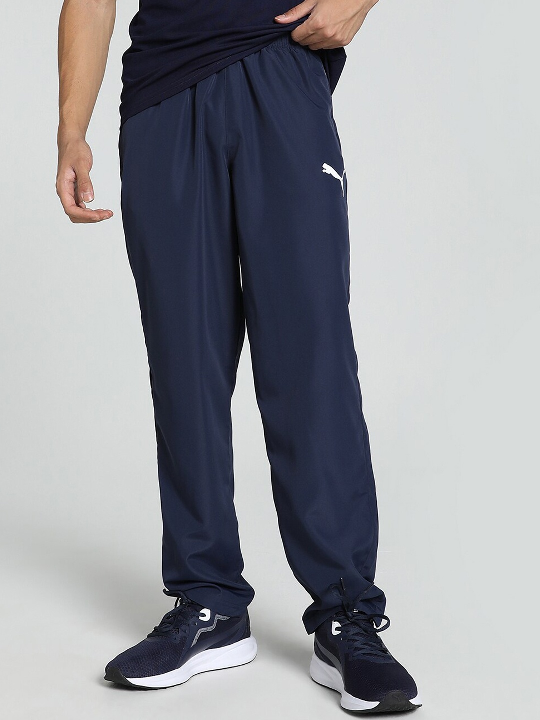 

Puma Men Brand Logo Printed Zippered Regular Fit Woven Track Pants, Navy blue