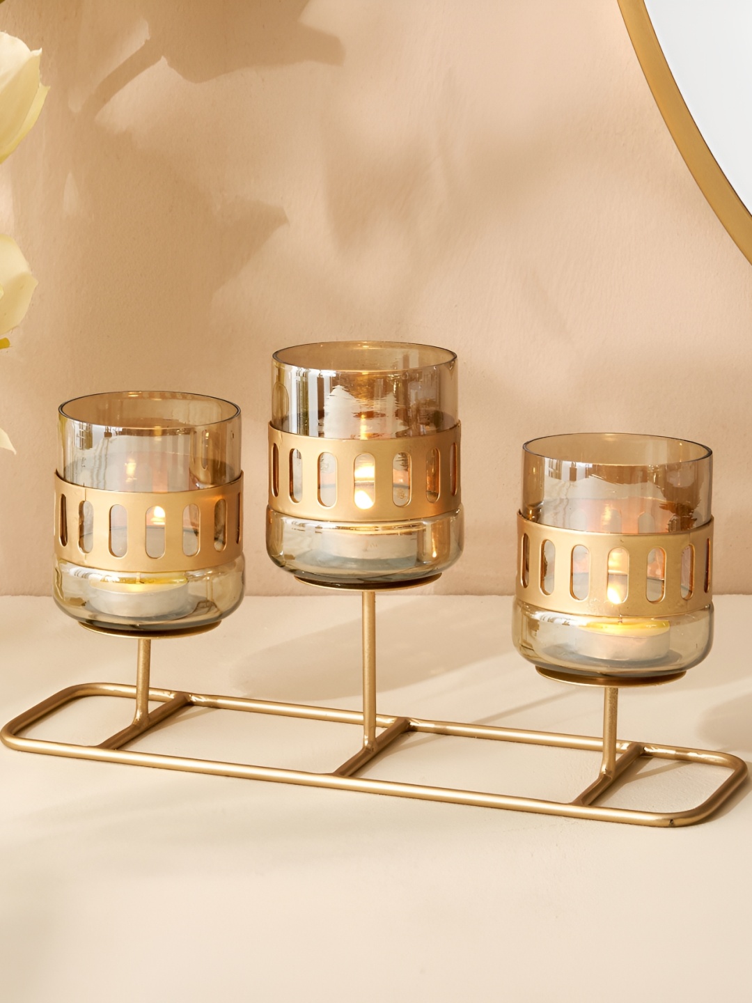 

Home Centre Gold-Toned Textured Glass Candle Holder