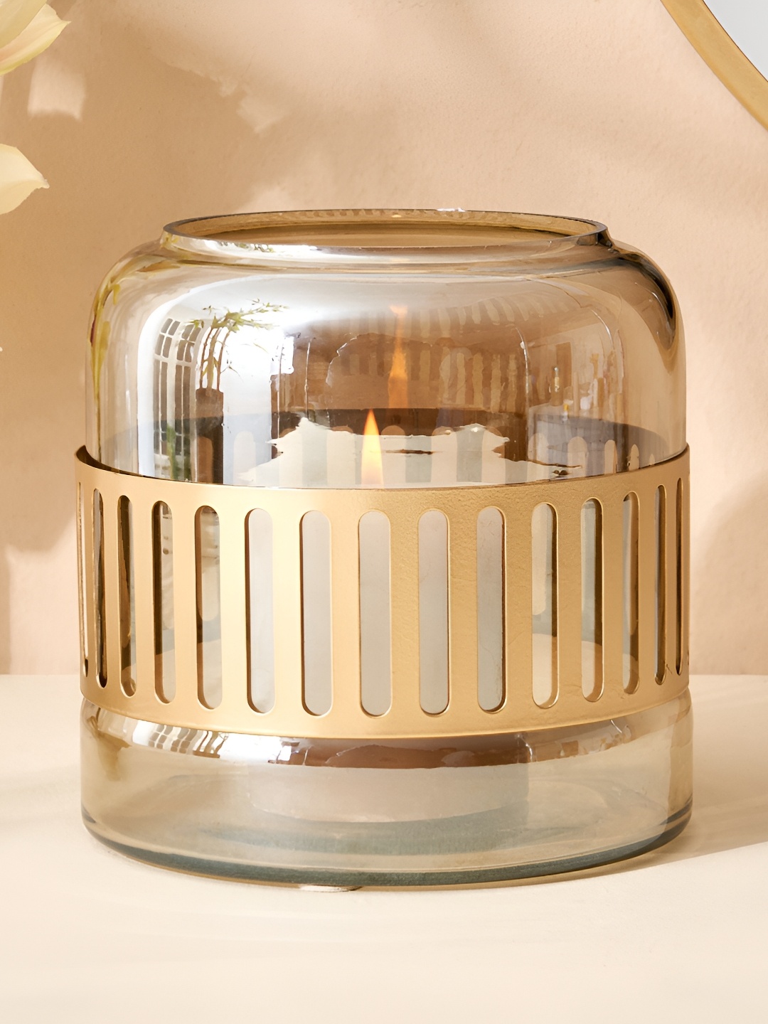 

Home Centre Gold-Toned Glass Candle Holder