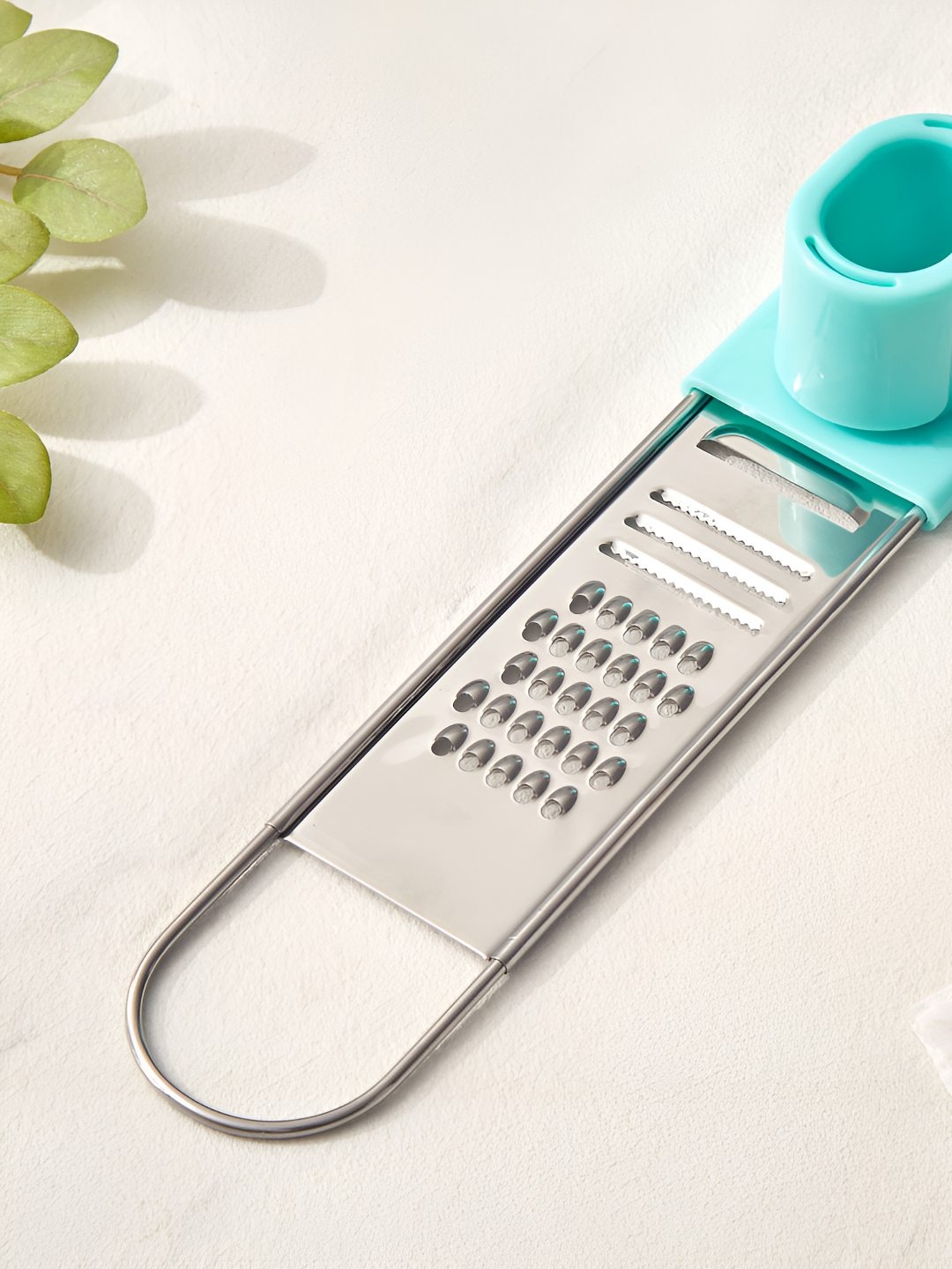 

Home Centre Rosemary Pablo Green Stainless Steel Garlic Grater