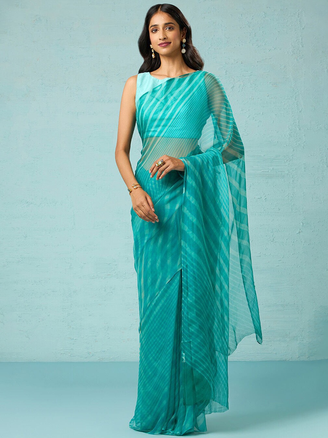

Taneira Leheriya Pure Georgette Saree, Green