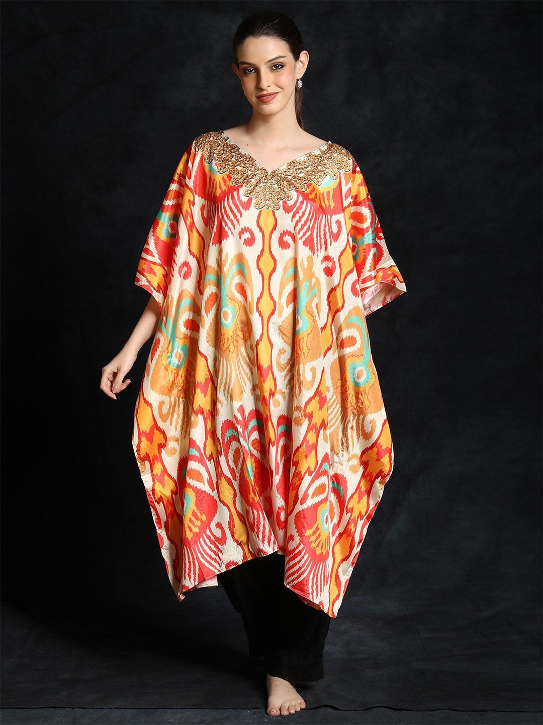 

Exotic India Cannoli Cream Short Kaftan with All-Over Multicolor Print & Beadwork on Neck