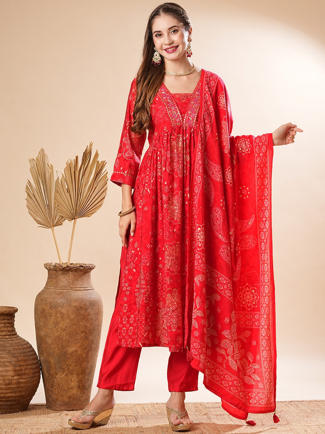 

FASHOR Floral Printed Pleated Aari Work A-Line Kurta With Trousers & Dupatta, Red