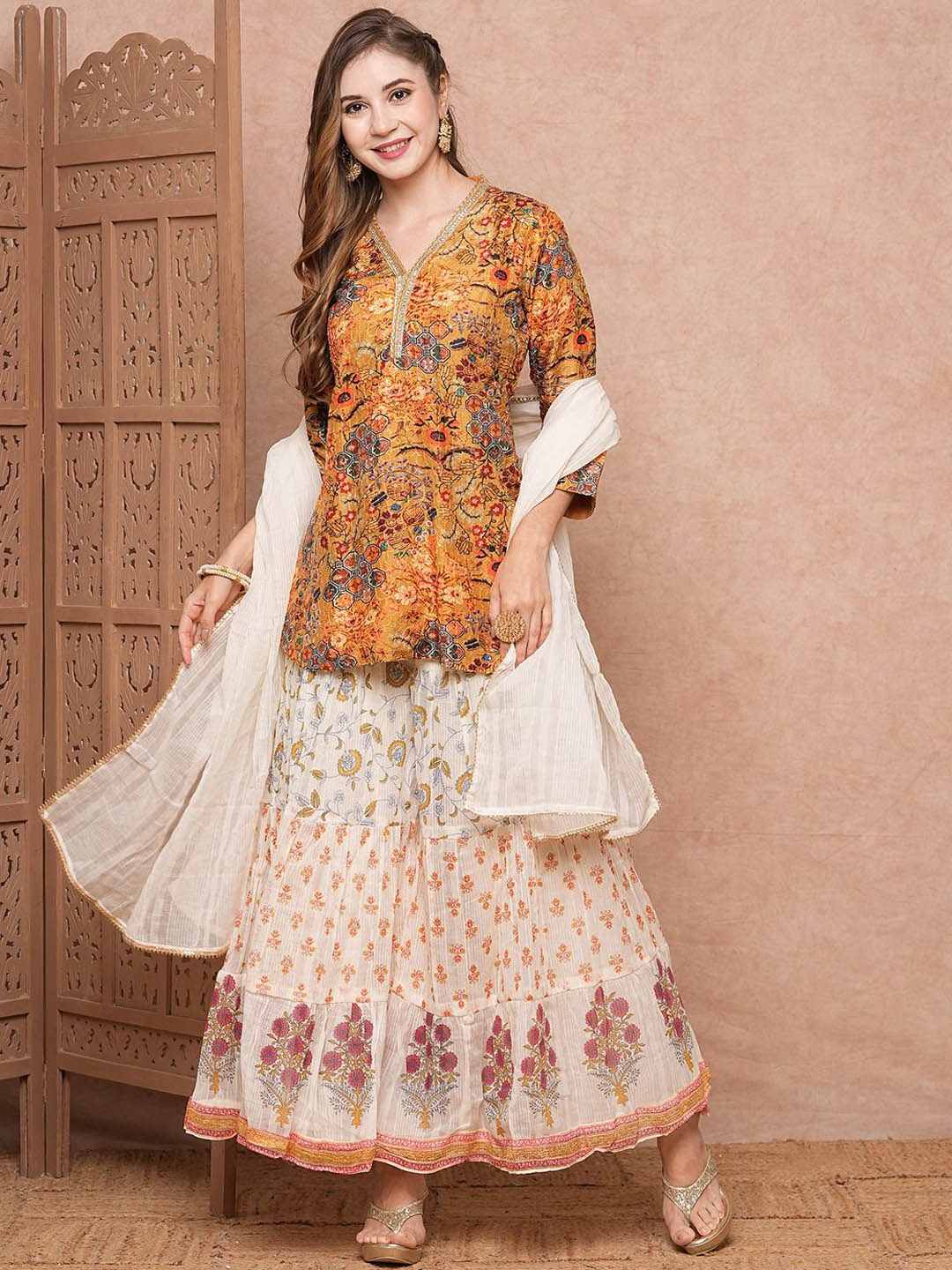 

FASHOR Floral Printed Regular Kurti with Sharara & With Dupatta, Mustard