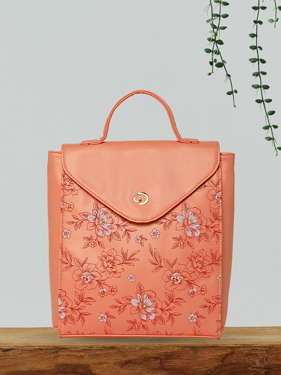 

Caprese Women Floral Printed Backpack, Orange
