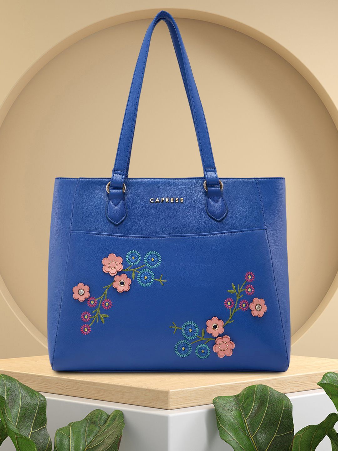 

Caprese Women Floral Embroidered PU Structured Handheld Bag, Blue