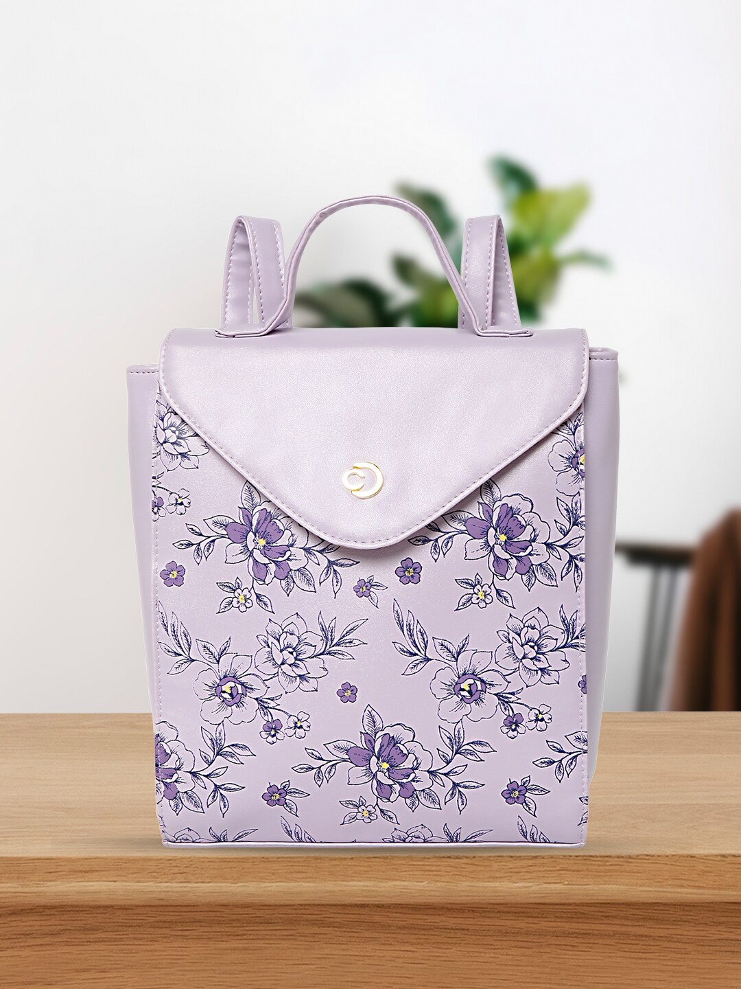 

Caprese Women Floral Printed Backpack, Lavender