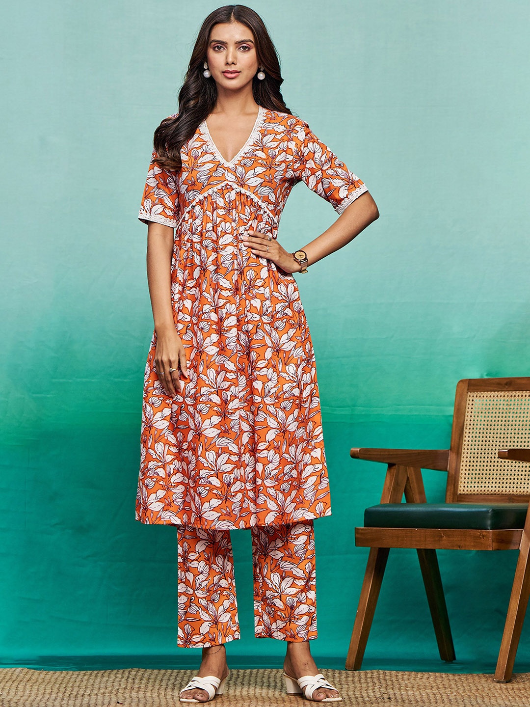 

Sangria Floral Printed V-Neck Empire Pure Cotton A-Line Kurta & Trousers, Orange