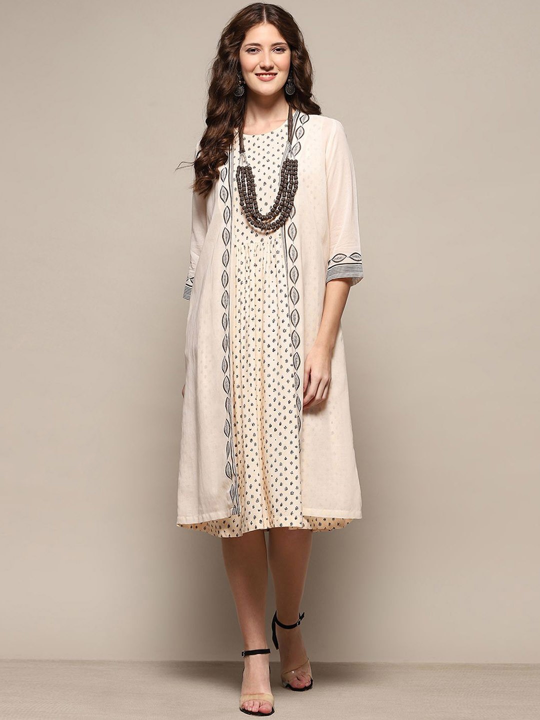 

Biba Ethnic Motifs Embroidered Round Neck Sleeveless Thread Work A-Line Kurta, Brown