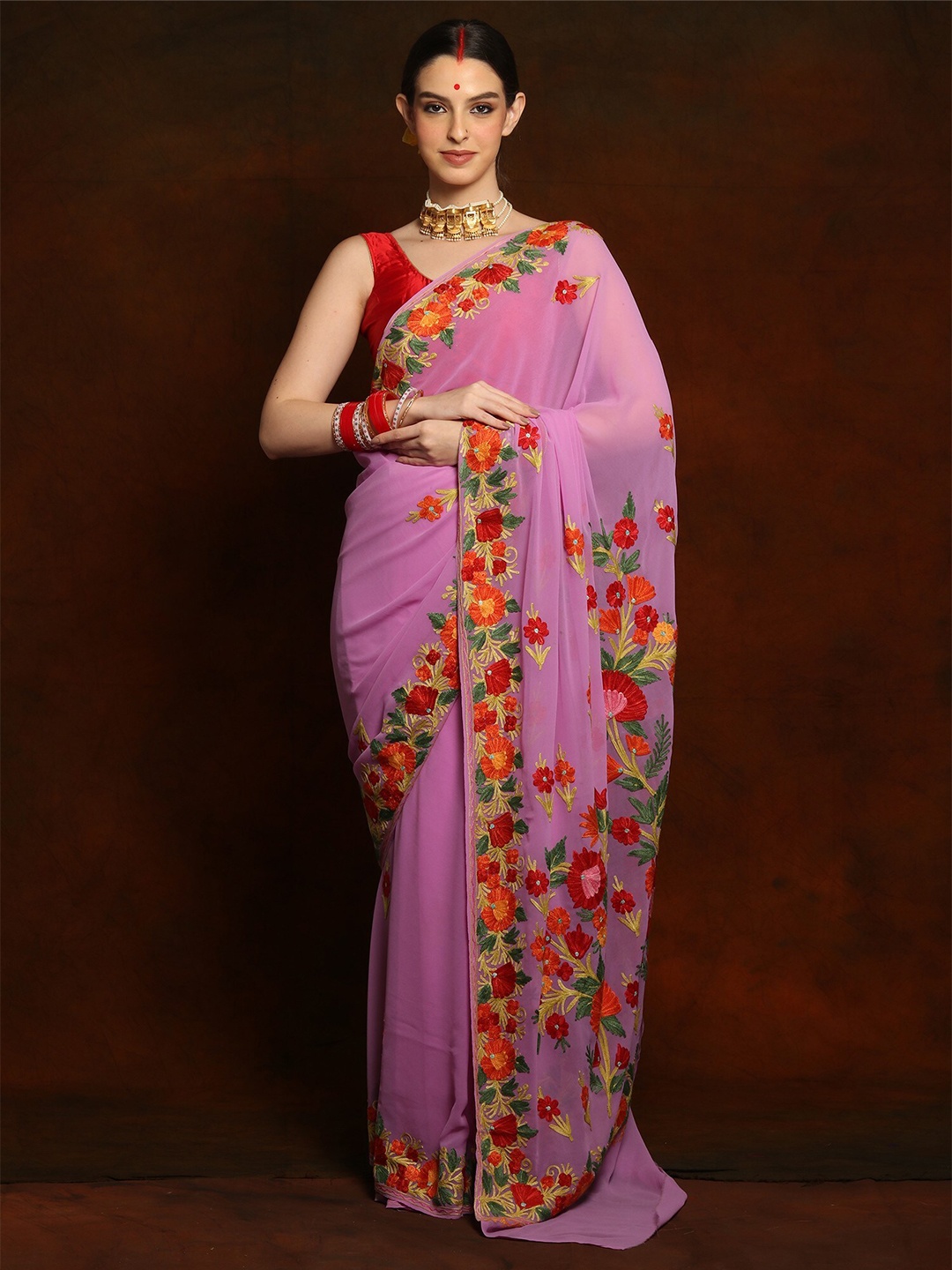 

Exotic India Embellished Embroidered Pure Georgette Saree, Purple