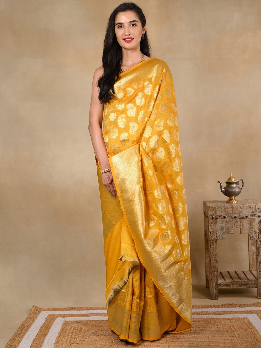 

Exotic India Pure Silk Banarasi Marigold Yellow Saree with Golden Zari Motifs